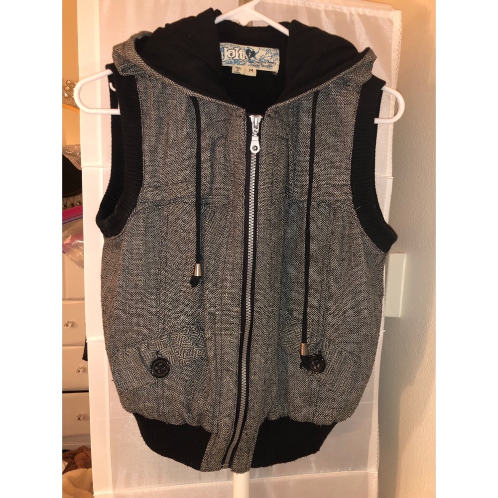 Black and gray zip up vest with hood